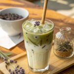 iced lavender matcha in glass with lavender garnish